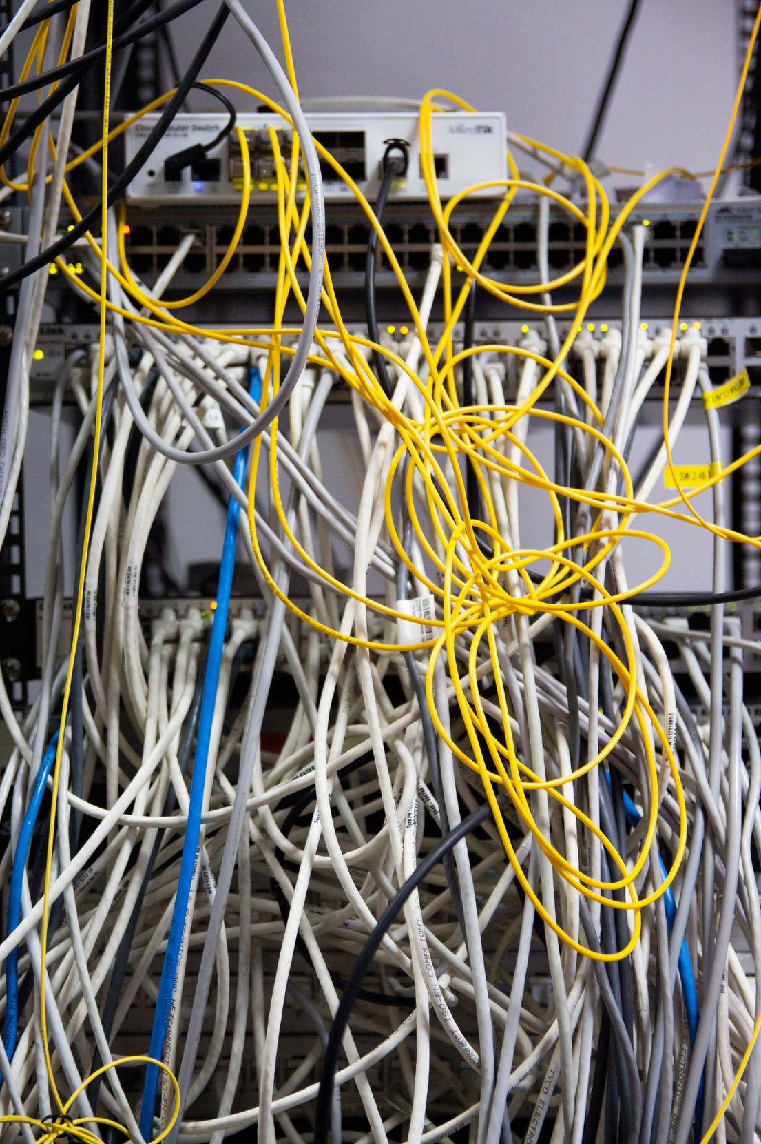 Network cables connected in a server rack