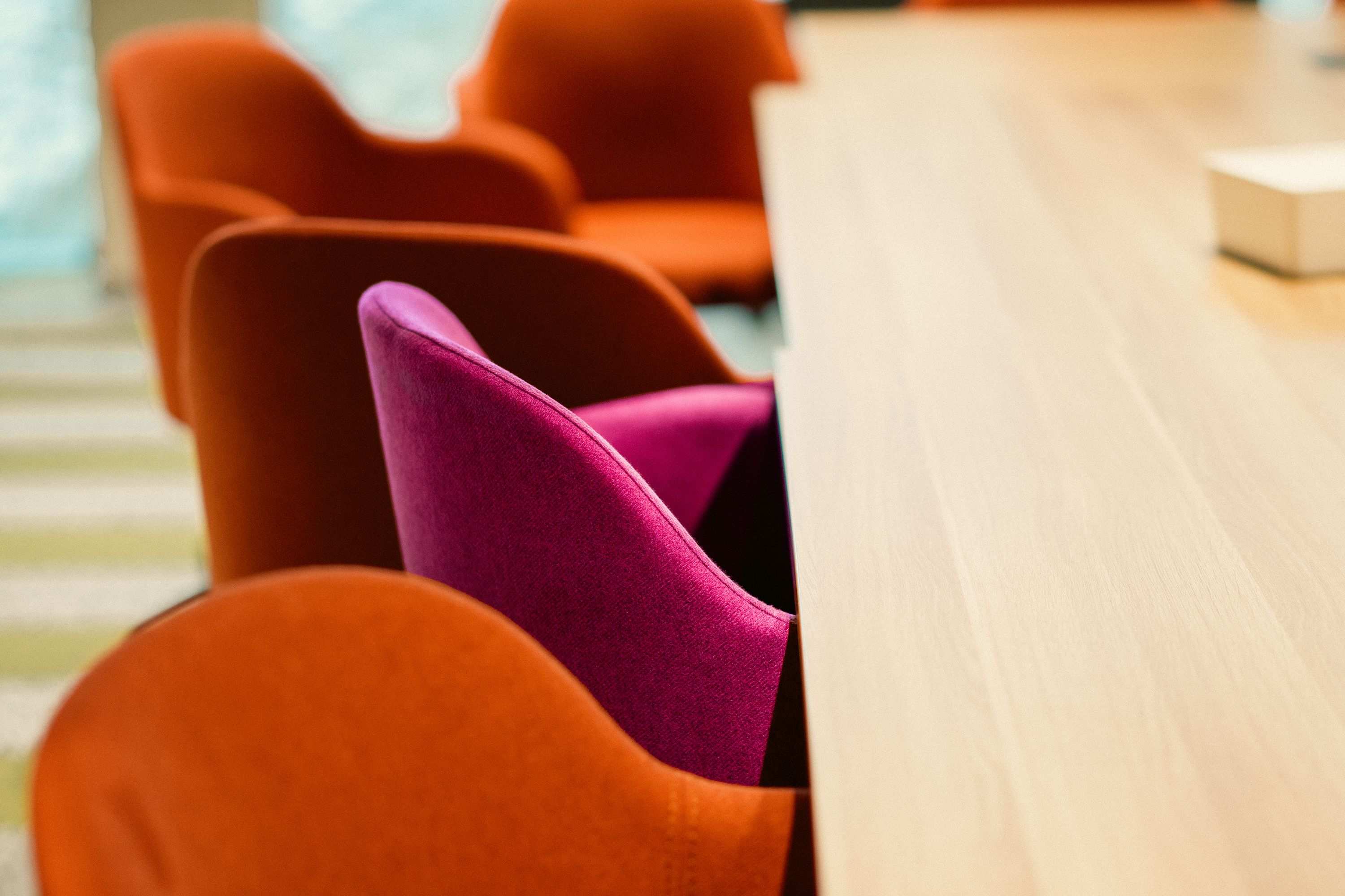 Empty conference room prepared for a working session with meeting chairs